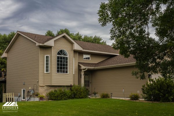 Evergreen Construction crew providing roof replacement in White Bear Lake, MN