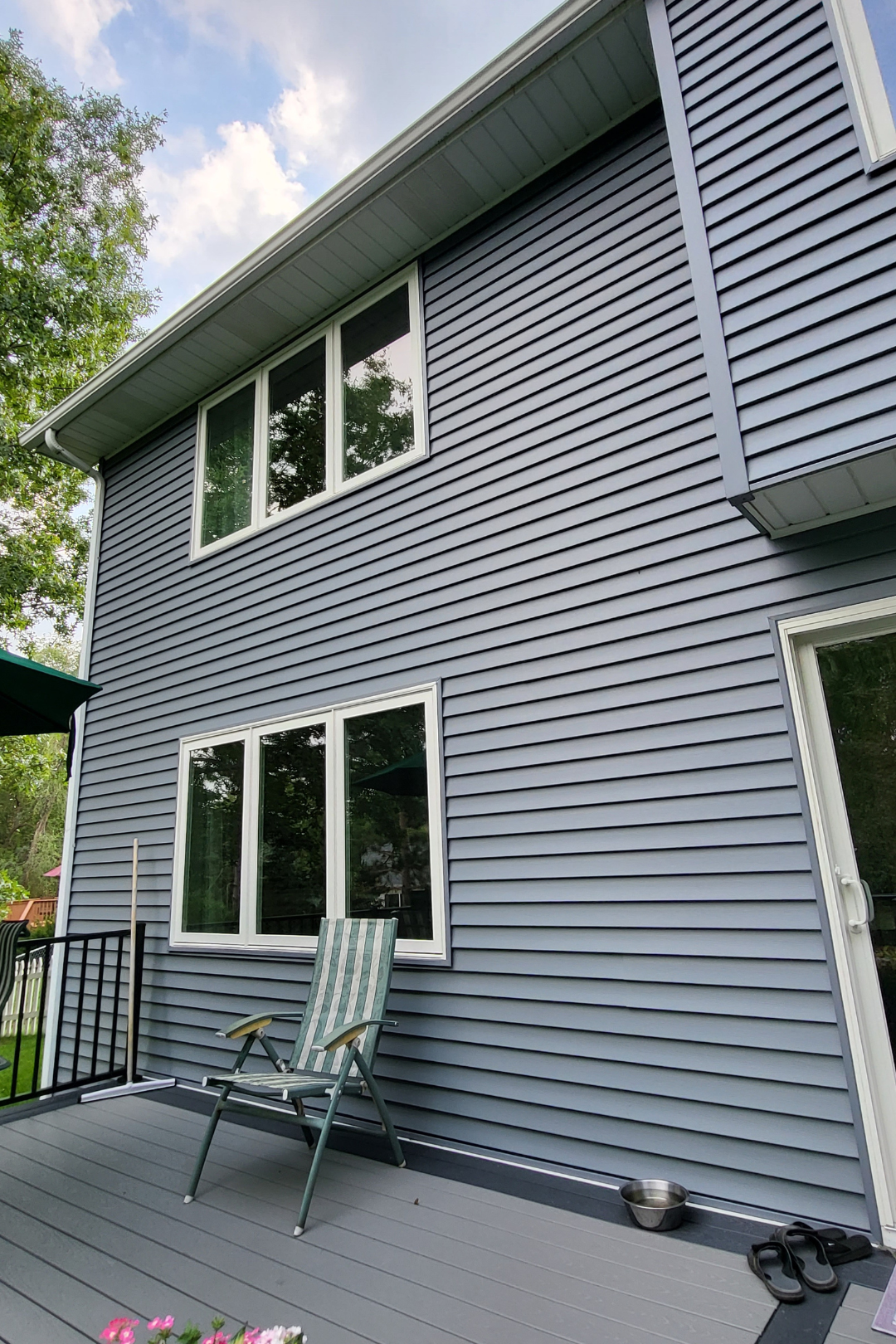 Woodbury home exterior remodel with Tamko Titan XT roof and Oceanside Market Square siding by Evergreen Construction